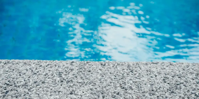 Concrete pool deck.