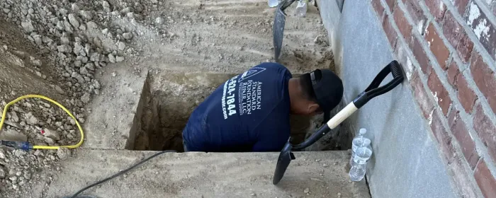 Diggin though the foundation to repair cracks and stabilize.